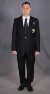 Man in member uniform outlined below