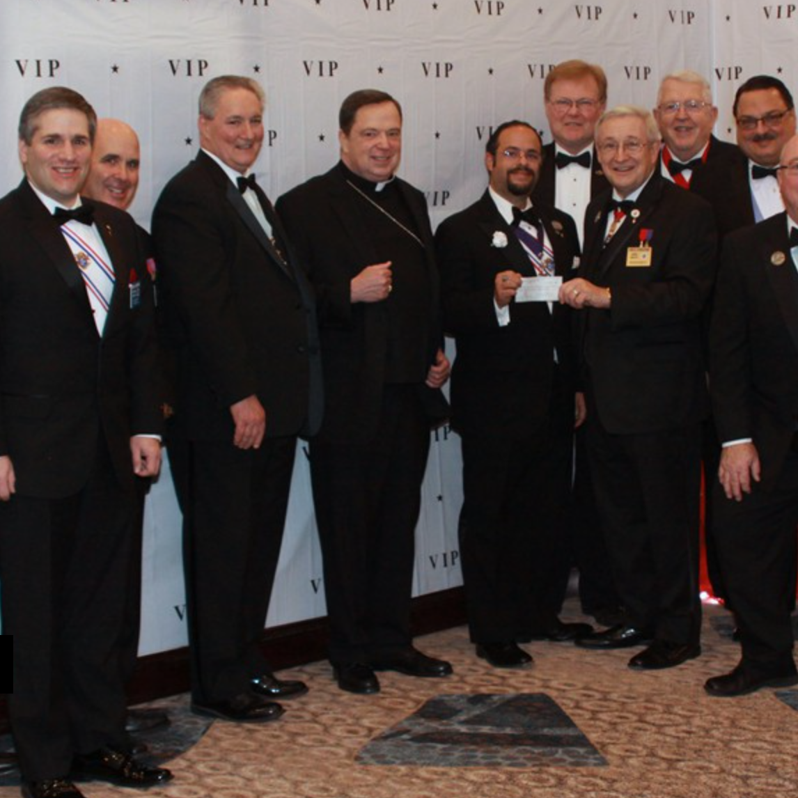 Men in tuxedoes who made the Mother of Good Counsel (#1078) charity ball happen.